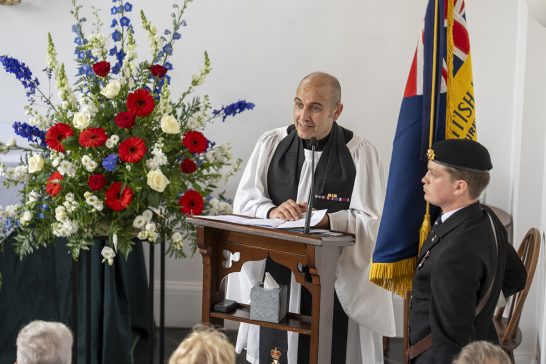 Padre Major Andy Latifa speaks at the ceremony, leading the remembrance service.